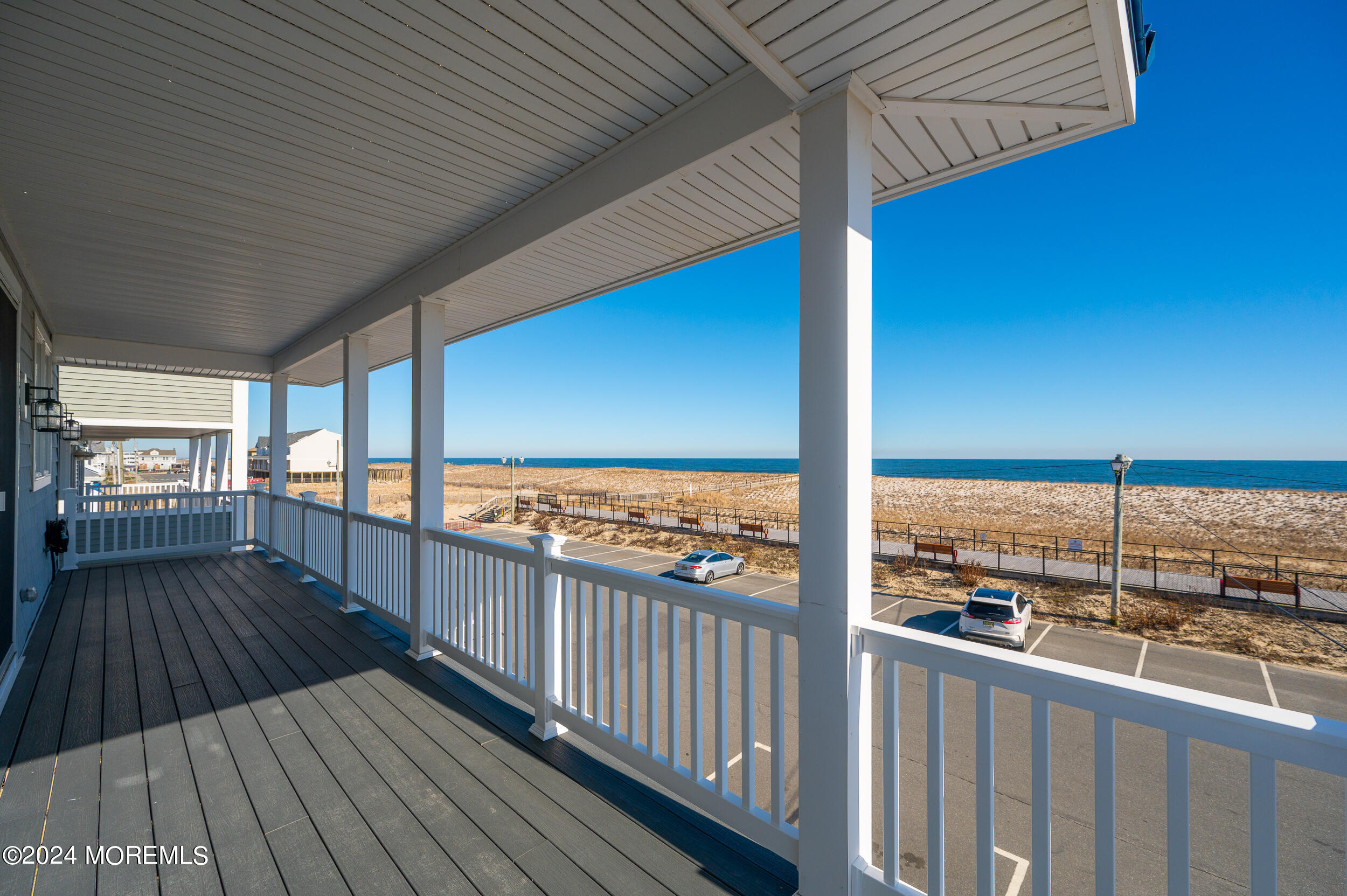 1851 Oceanfront Seaside Heights, NJ 08751 - Photo 34 of 66 a view of a balcony with wooden floor