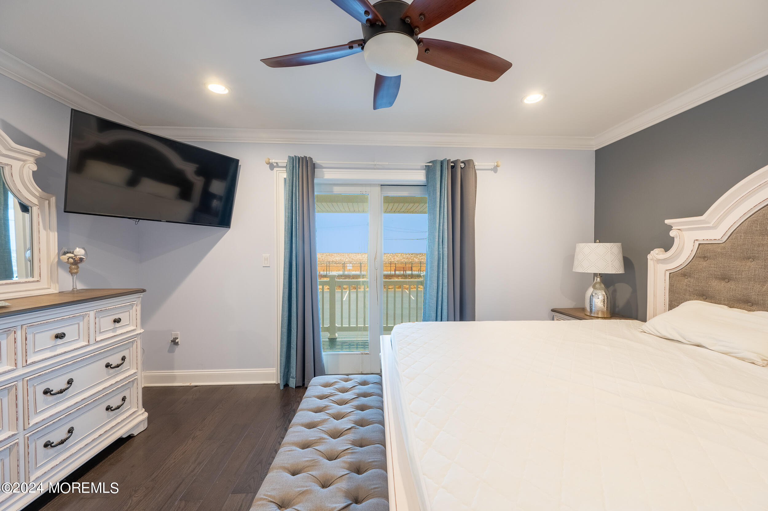 1851 Oceanfront Seaside Heights, NJ 08751 - Photo 39 of 66 a bedroom with a bed and a flat screen tv