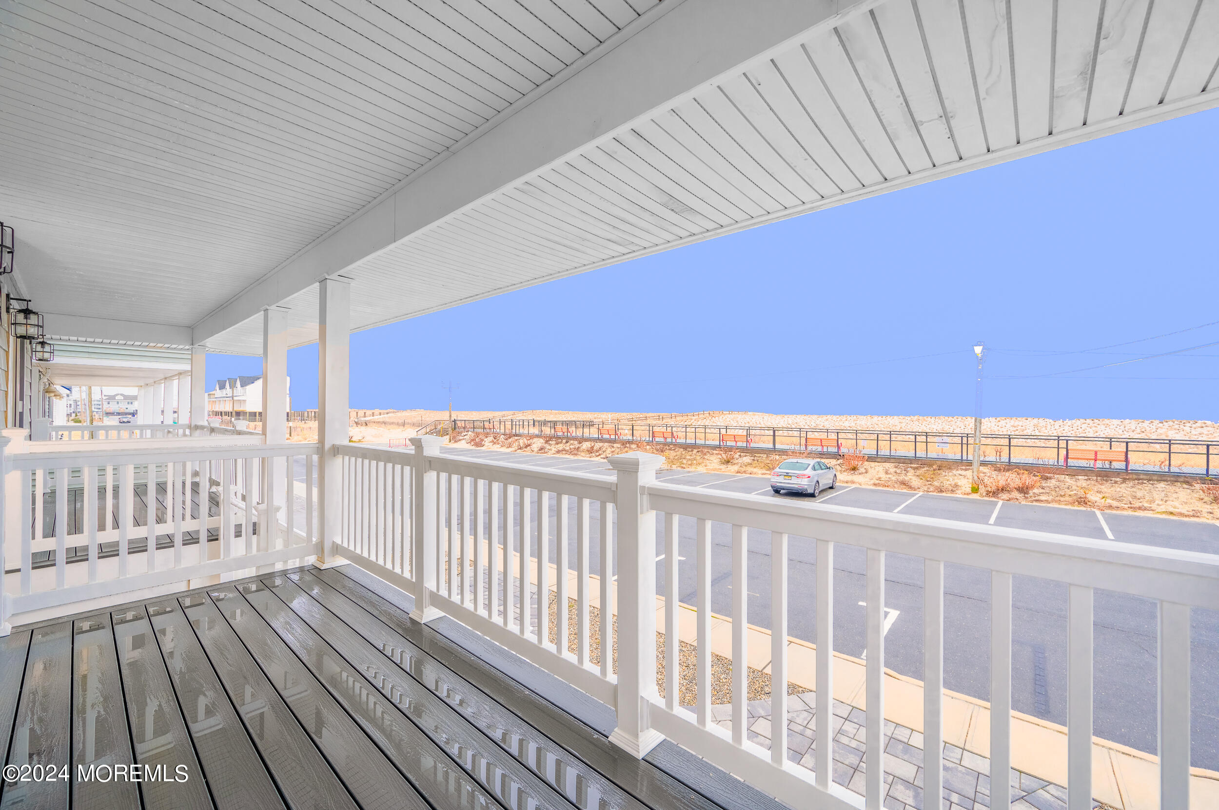 1851 Oceanfront Seaside Heights, NJ 08751 - Photo 42 of 66 a view of a balcony with wooden floor