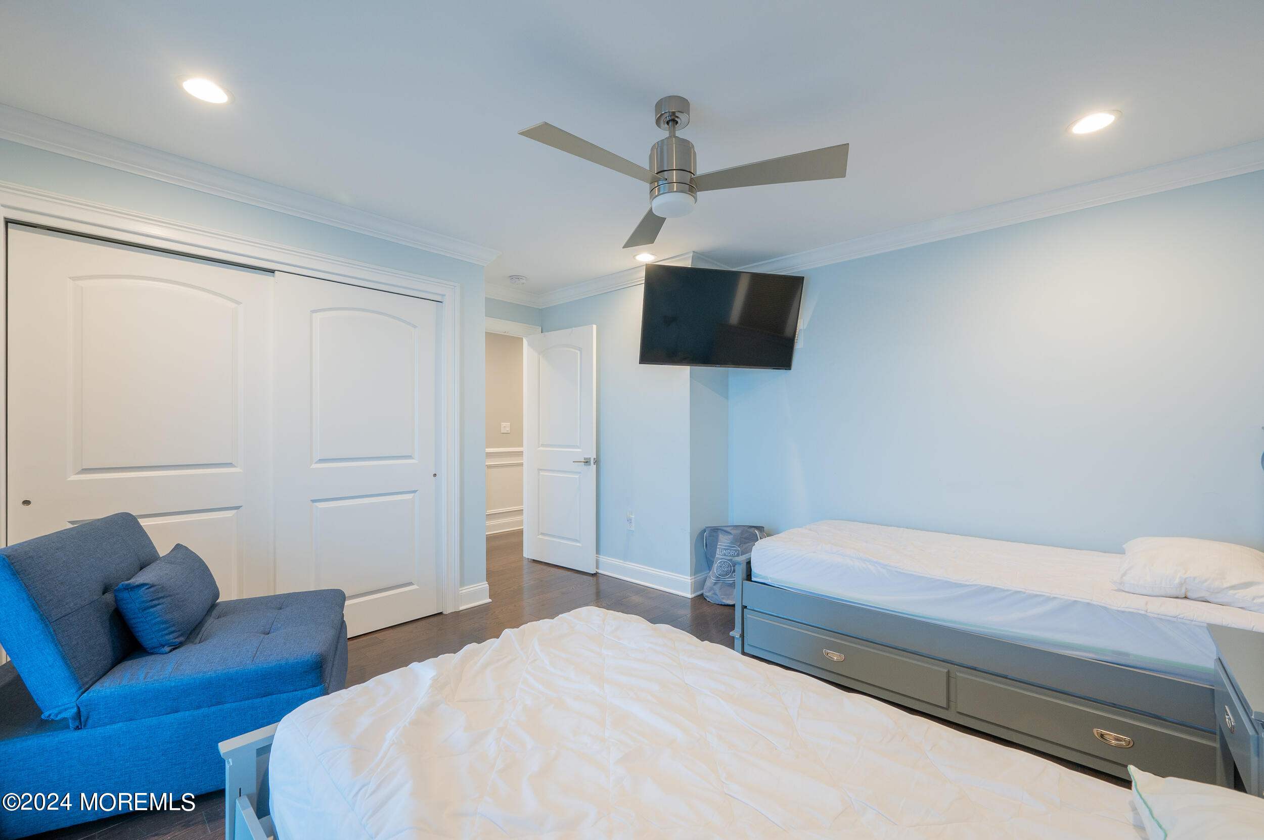 1851 Oceanfront Seaside Heights, NJ 08751 - Photo 45 of 66 a bedroom with a bed and a flat screen tv