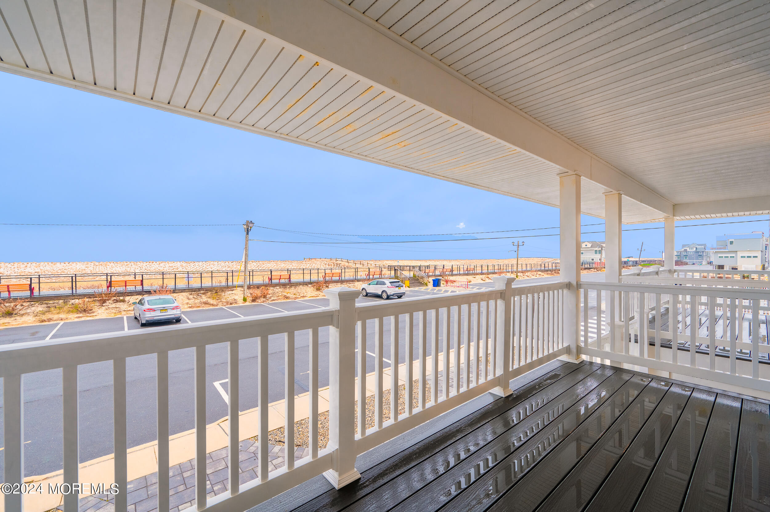 1851 Oceanfront Seaside Heights, NJ 08751 - Photo 46 of 66 a view of a balcony with wooden floor