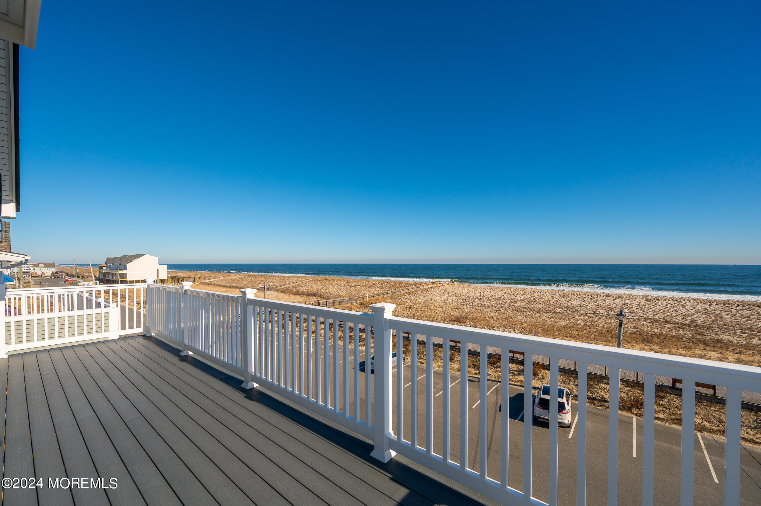 1851 Oceanfront Seaside Heights, NJ 08751 - Photo 62 of 66 a view of a balcony with wooden floor