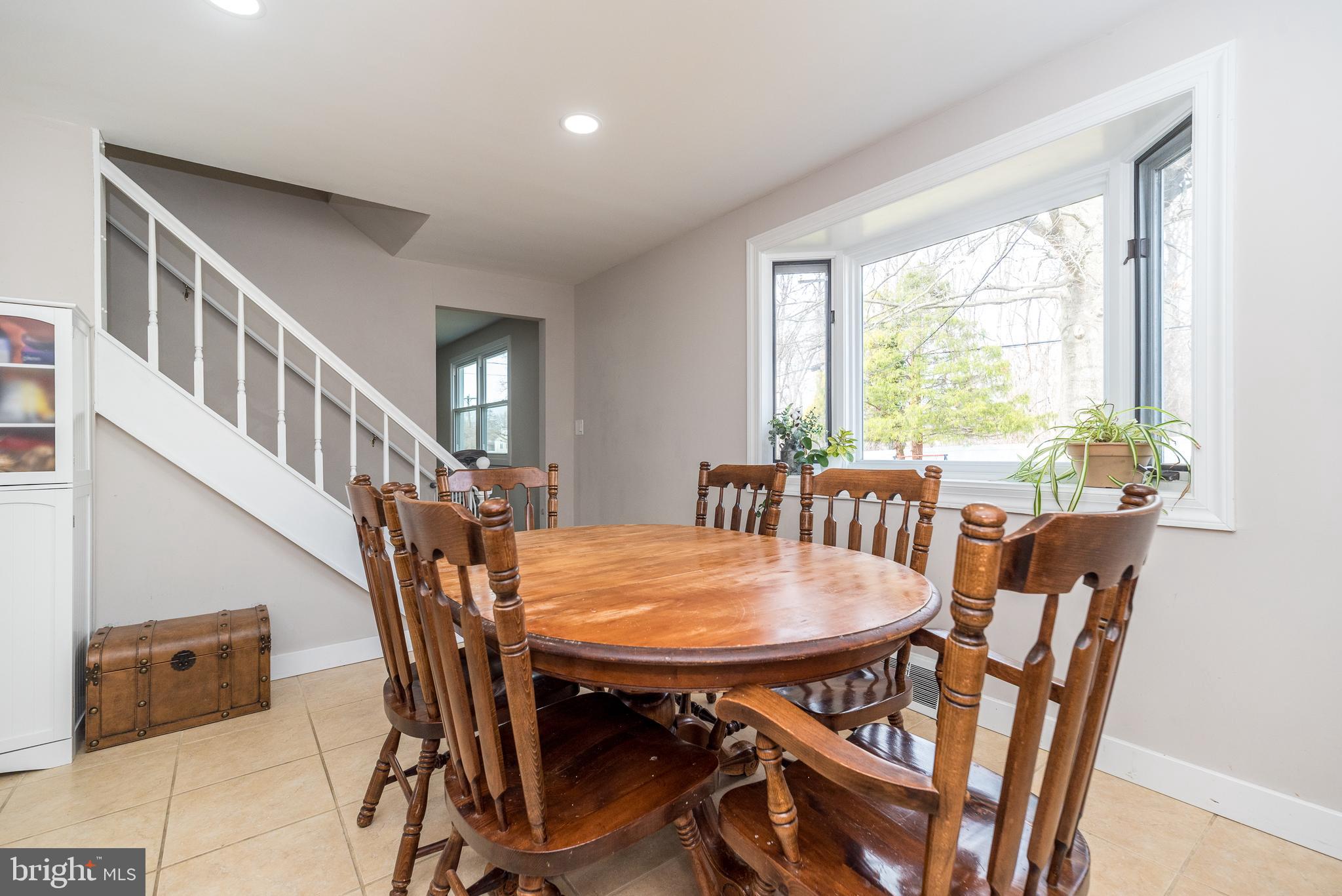 253 Luff Lane Warminster, PA 18974 - Photo 12 of 30 a view of a dining room with furniture window and wooden floor