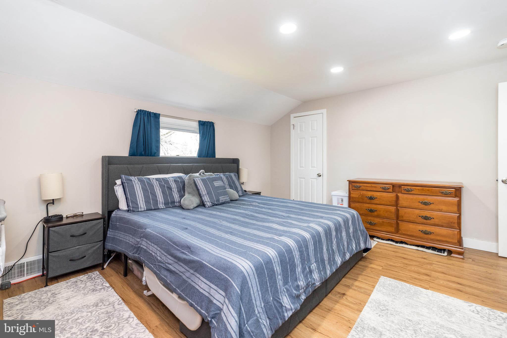253 Luff Lane Warminster, PA 18974 - Photo 19 of 30 a bedroom with a bed and dresser