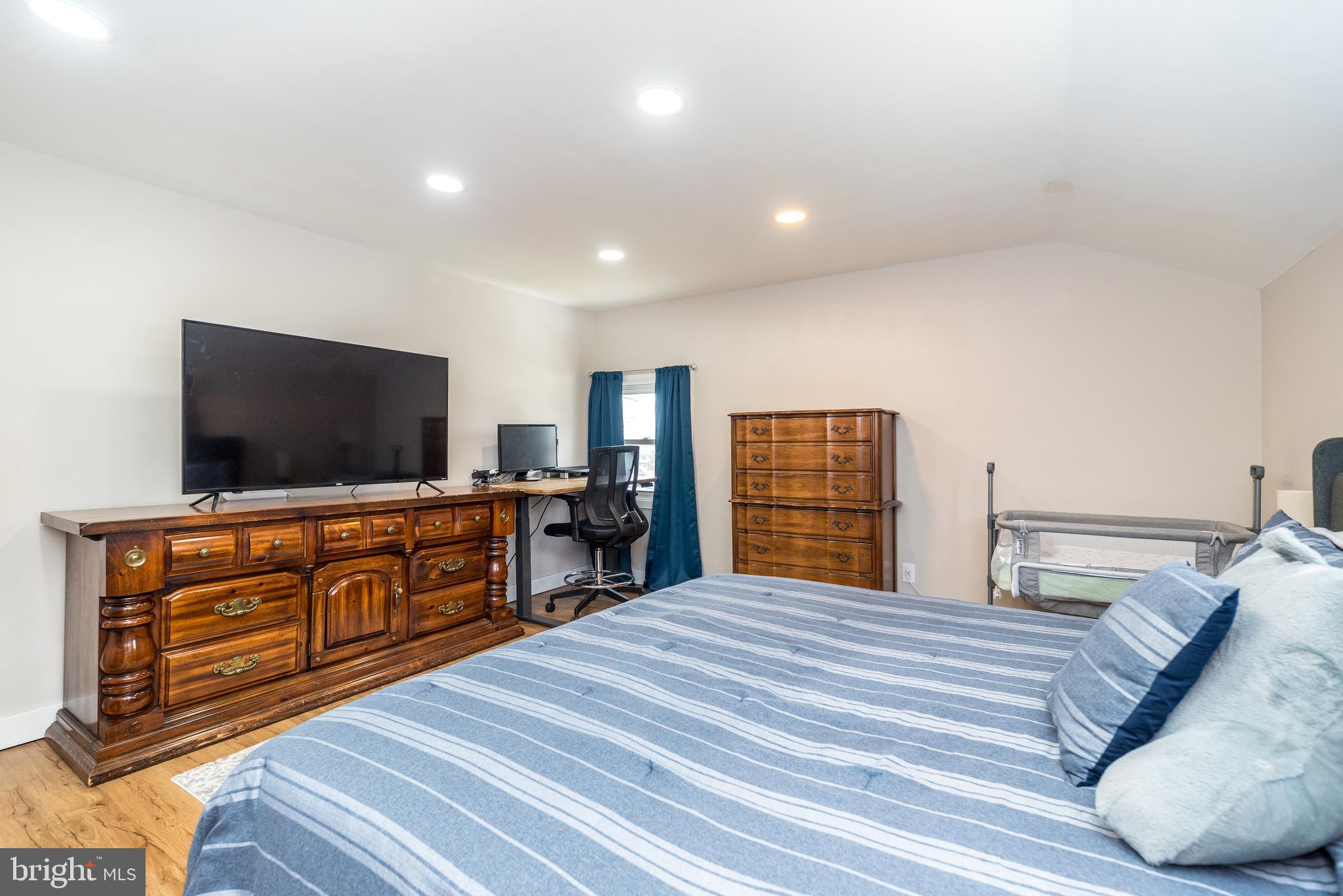253 Luff Lane Warminster, PA 18974 - Photo 20 of 30 a bedroom with furniture and flat screen tv