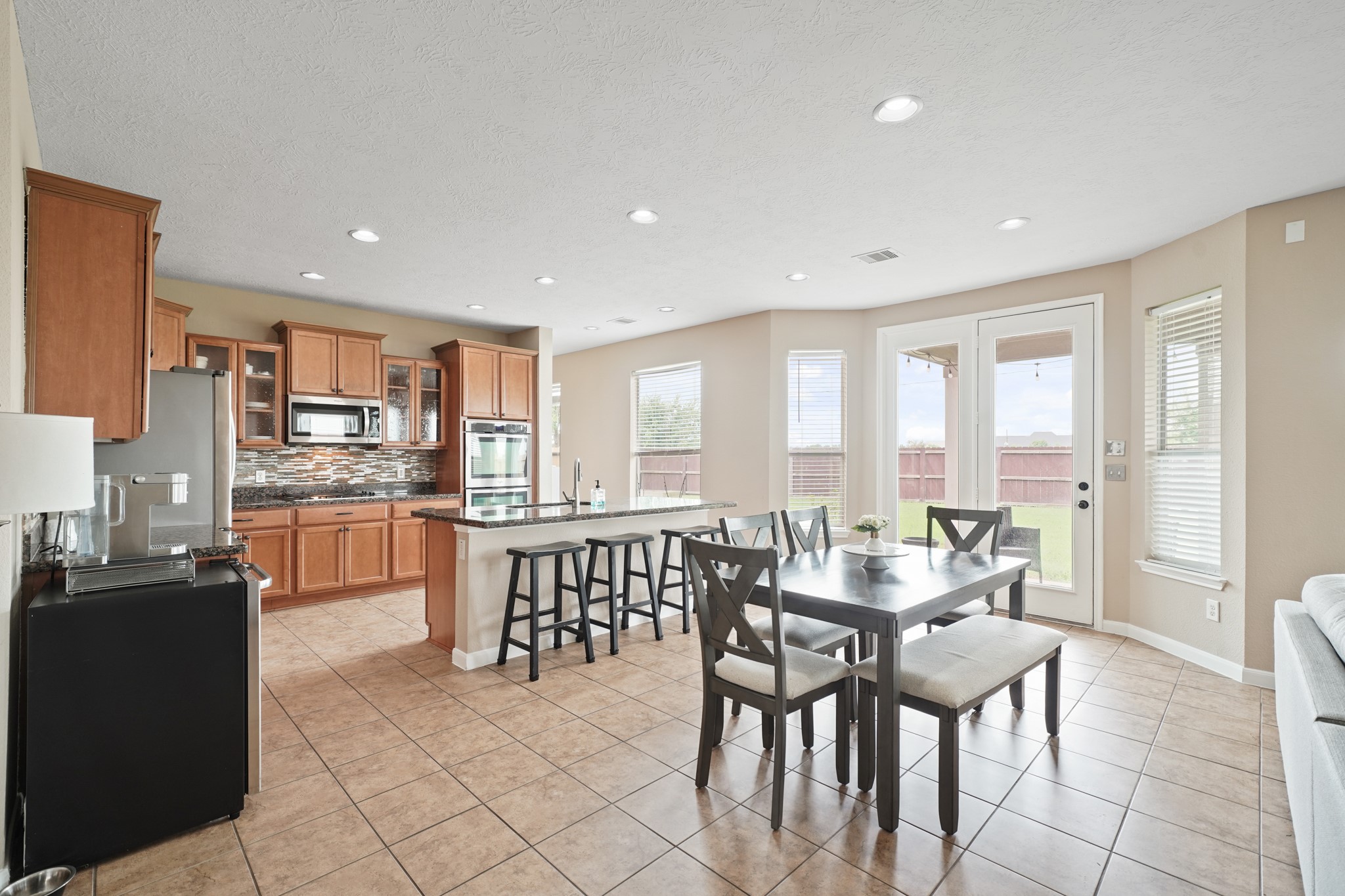 2502 J. R. Drive Manvel, TX 77578 - Photo 11 of 31 a view of a dining room with furniture