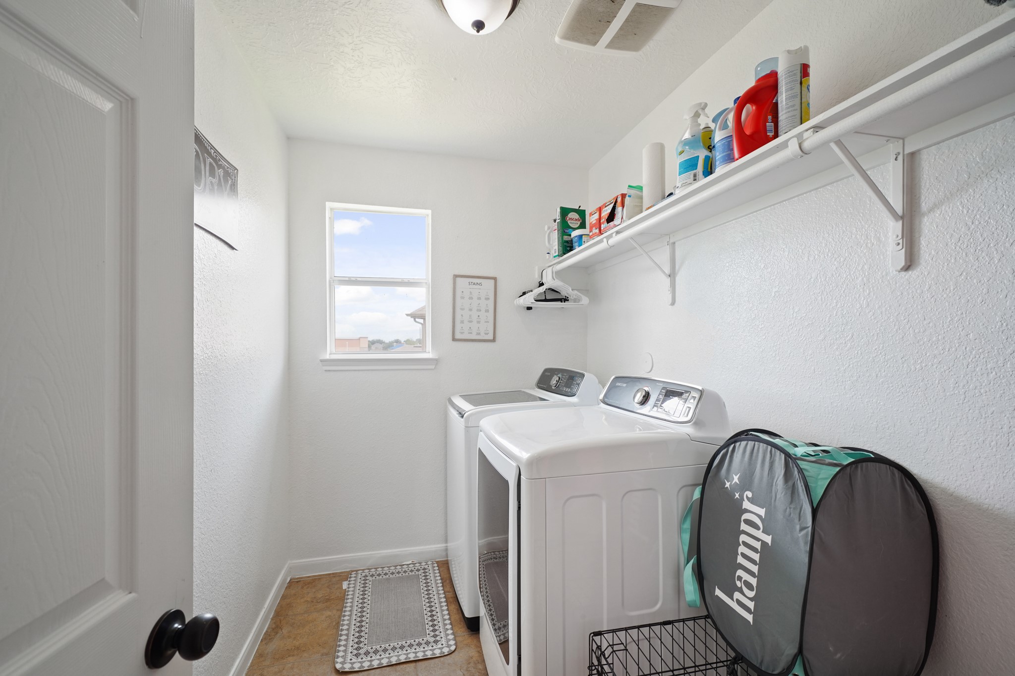 2502 J. R. Drive Manvel, TX 77578 - Photo 23 of 31 a utility room with dryer and washer