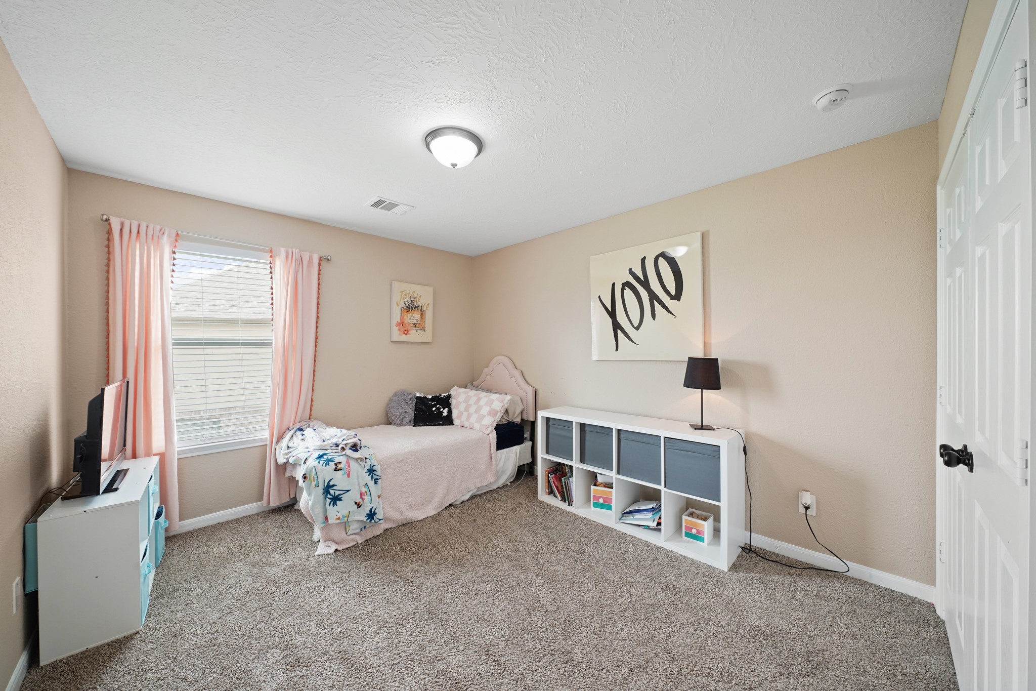 2502 J. R. Drive Manvel, TX 77578 - Photo 24 of 31 a bedroom with furniture and a window