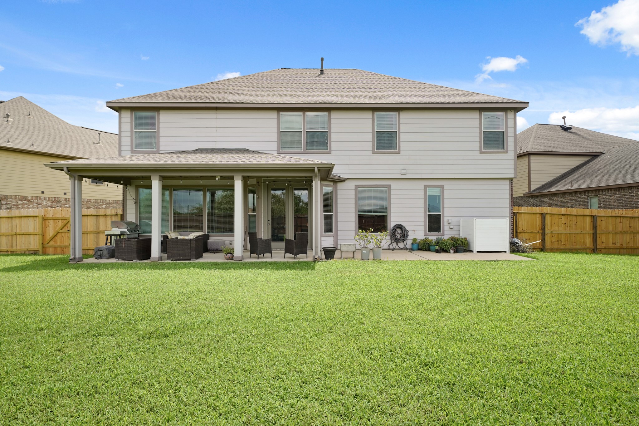 2502 J. R. Drive Manvel, TX 77578 - Photo 28 of 31 a front view of a house with a yard and porch