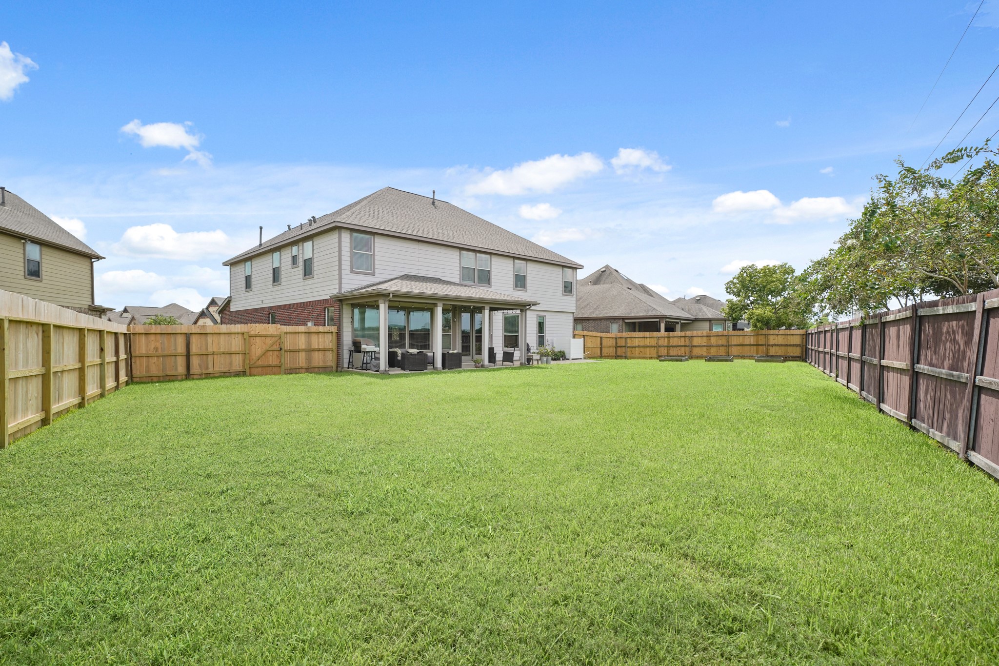 2502 J. R. Drive Manvel, TX 77578 - Photo 29 of 31 a view of a house with backyard and porch