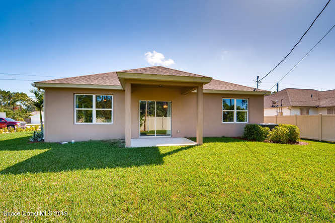 766 Fletcher Road Southeast Palm Bay, FL 32909 - Photo 11 of 20 The Cali-small-011-009-Exterior Rear-666