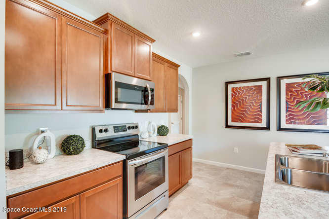 766 Fletcher Road Southeast Palm Bay, FL 32909 - Photo 3 of 20 The Cali-small-004-003-Kitchen-666x445-7
