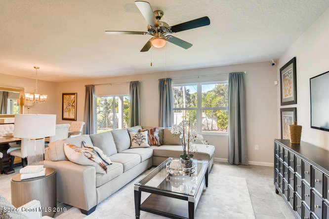 766 Fletcher Road Southeast Palm Bay, FL 32909 - Photo 4 of 20 The Cali-small-002-006-Living Room-666x4