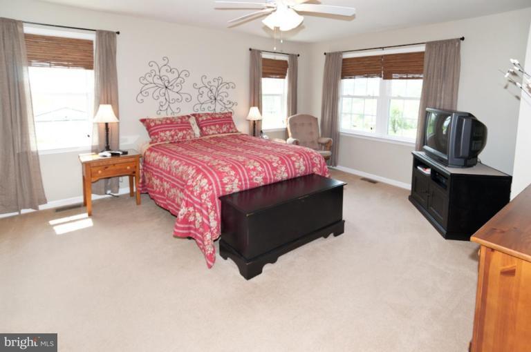 4265 Middlepoint Road Myersville, MD 21773 - Photo 16 of 25 a bedroom with a bed and window