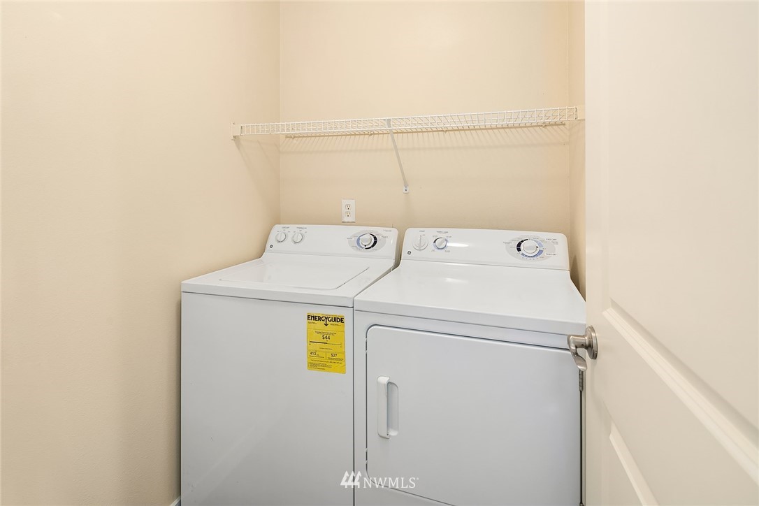 3926 243rd Place Southeast, Unit H301 Bothell, WA 98021 - Photo 11 of 16 a utility room with dryer and washer