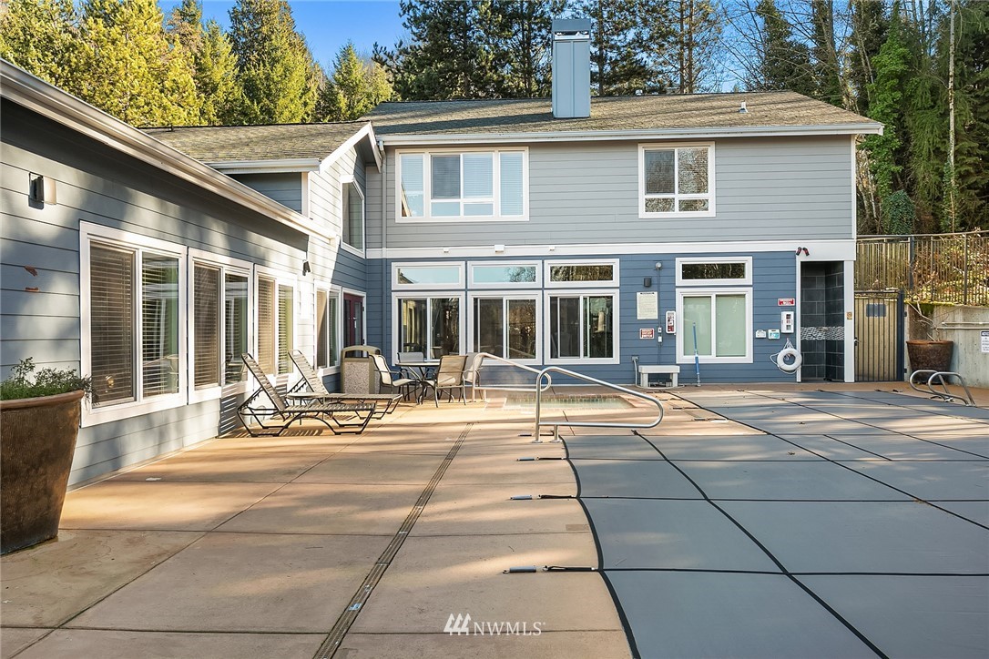 3926 243rd Place Southeast, Unit H301 Bothell, WA 98021 - Photo 15 of 16 a view of a house with a patio