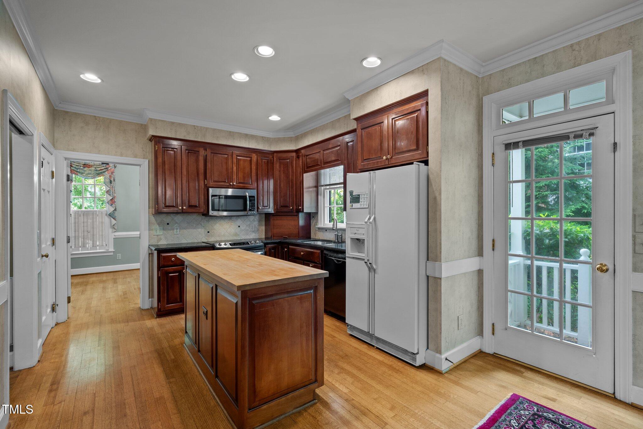 2113 Fallon Oaks Court Raleigh, NC 27608 - Photo 5 of 23 Kitchen w/ butcher block island