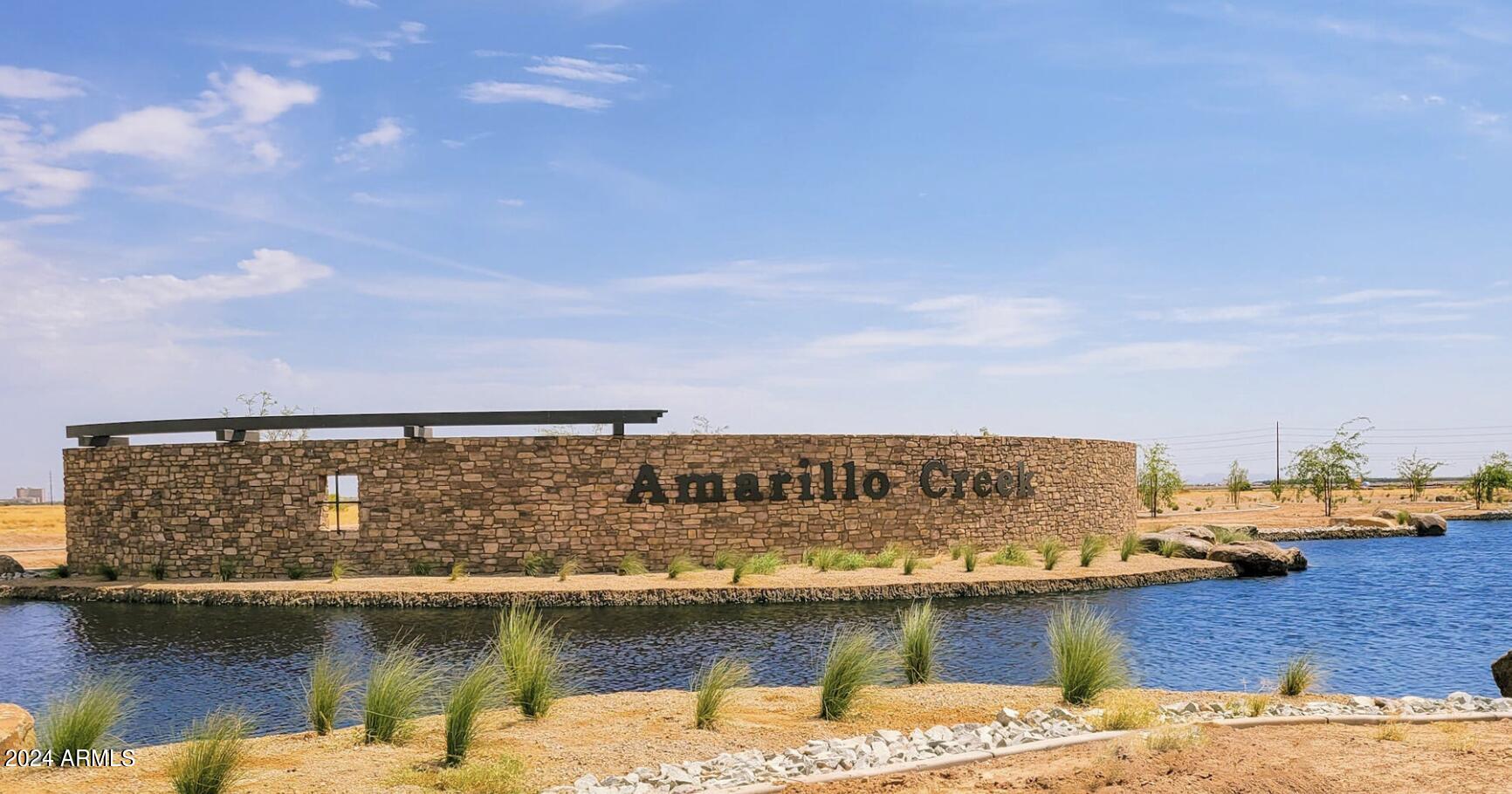 47802 West Cansados Road Maricopa, AZ 85139 - Photo 6 of 17 a view of ocean with boats and trees in the background