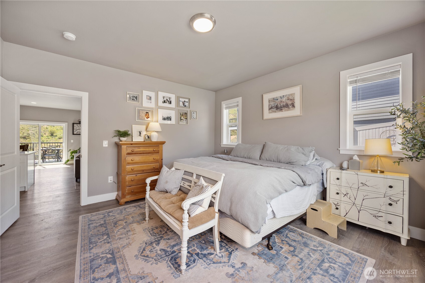 9968 Griffith Place Entiat, WA 98822 - Photo 15 of 38 a bedroom with a bed and a tv on the dresser