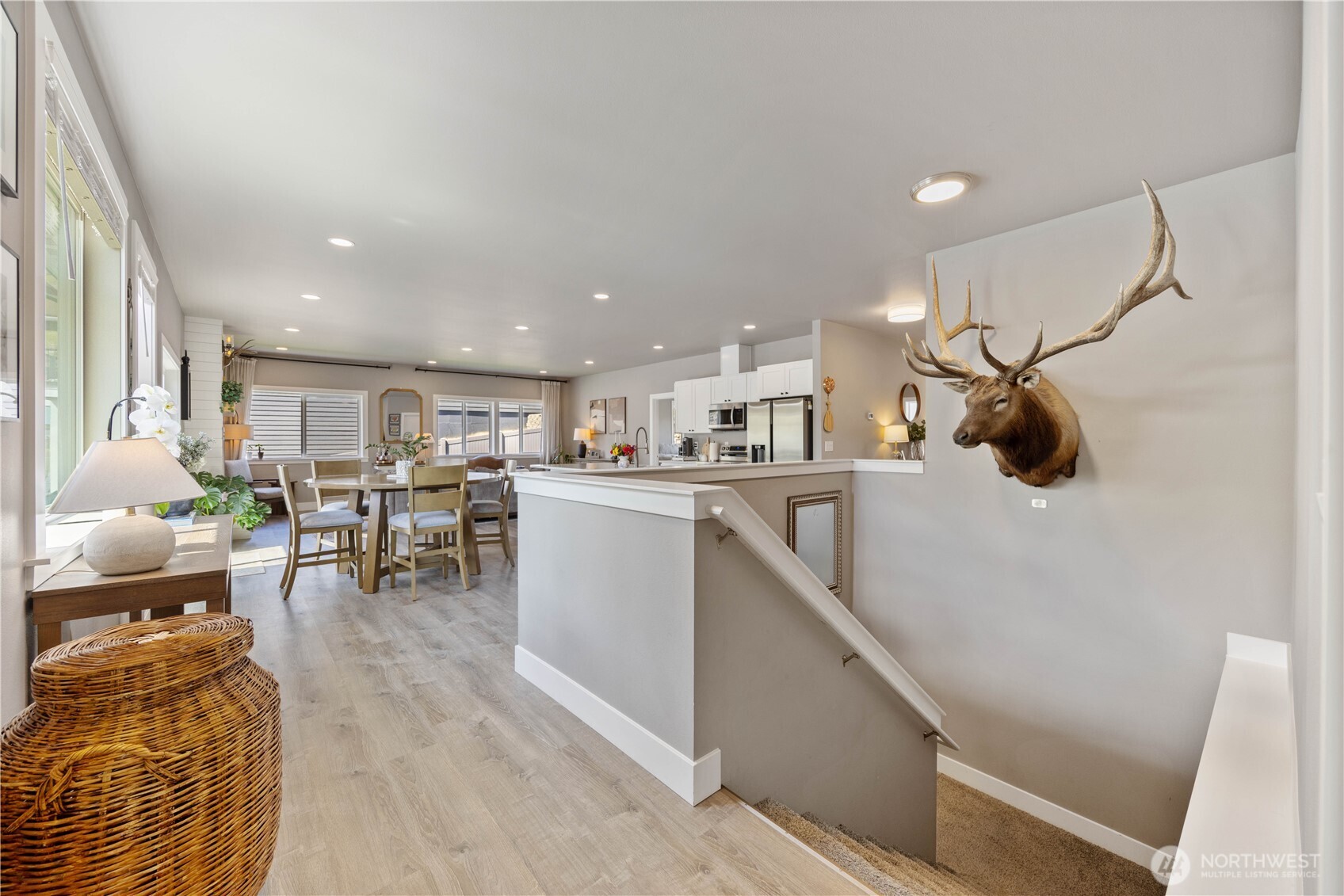 9968 Griffith Place Entiat, WA 98822 - Photo 18 of 38 a living room with stainless steel appliances kitchen island granite countertop a couch and a view of living room
