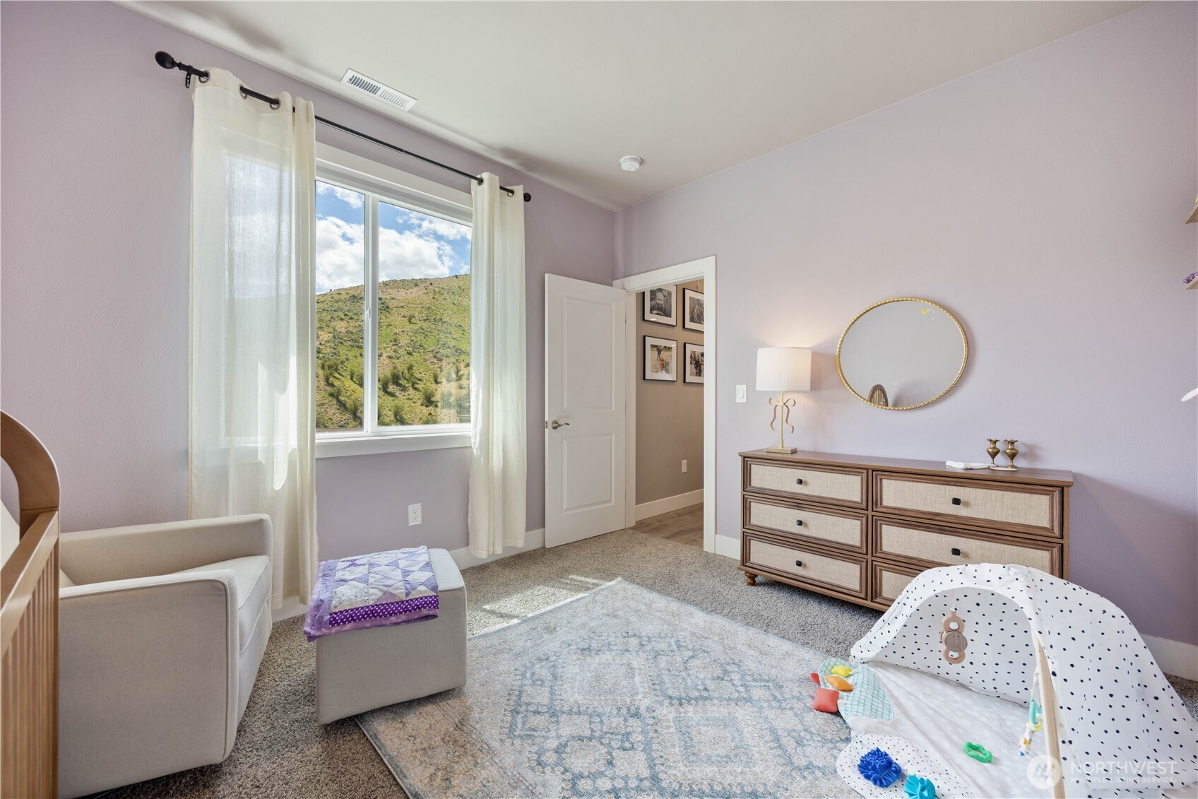 9968 Griffith Place Entiat, WA 98822 - Photo 19 of 38 a room with furniture and a window