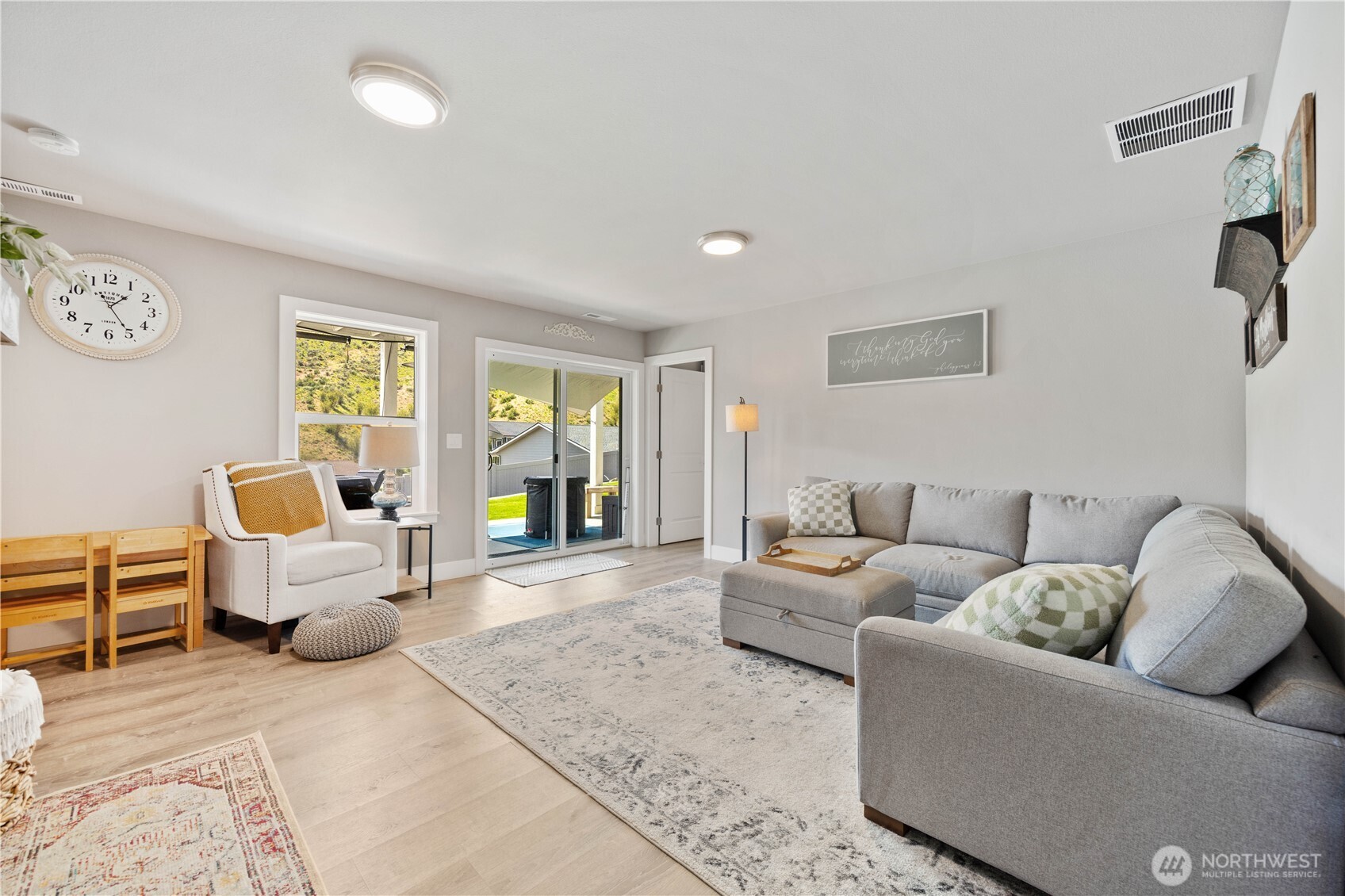 9968 Griffith Place Entiat, WA 98822 - Photo 23 of 38 a living room with furniture and a large window