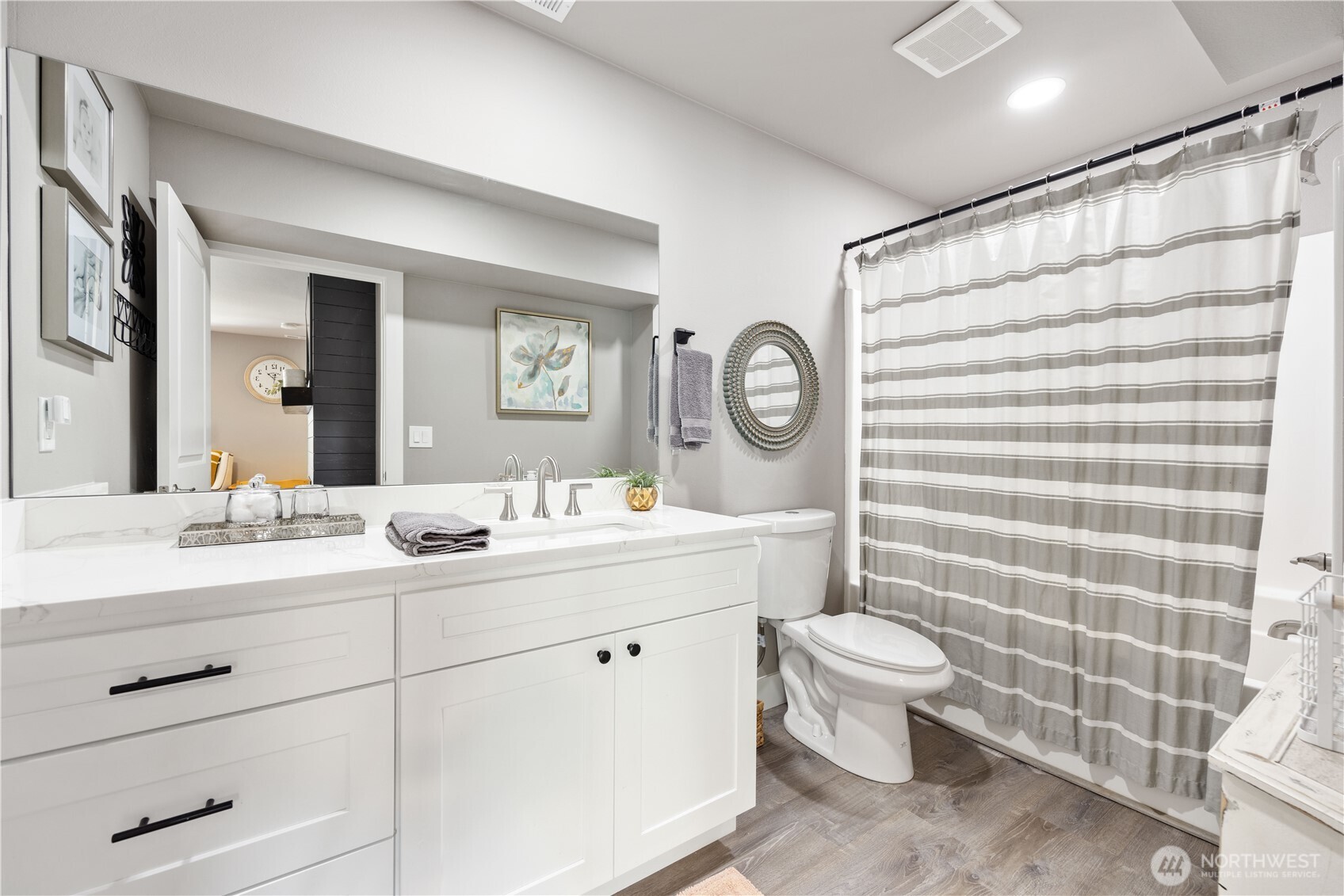 9968 Griffith Place Entiat, WA 98822 - Photo 24 of 38 a bathroom with a toilet sink and mirror