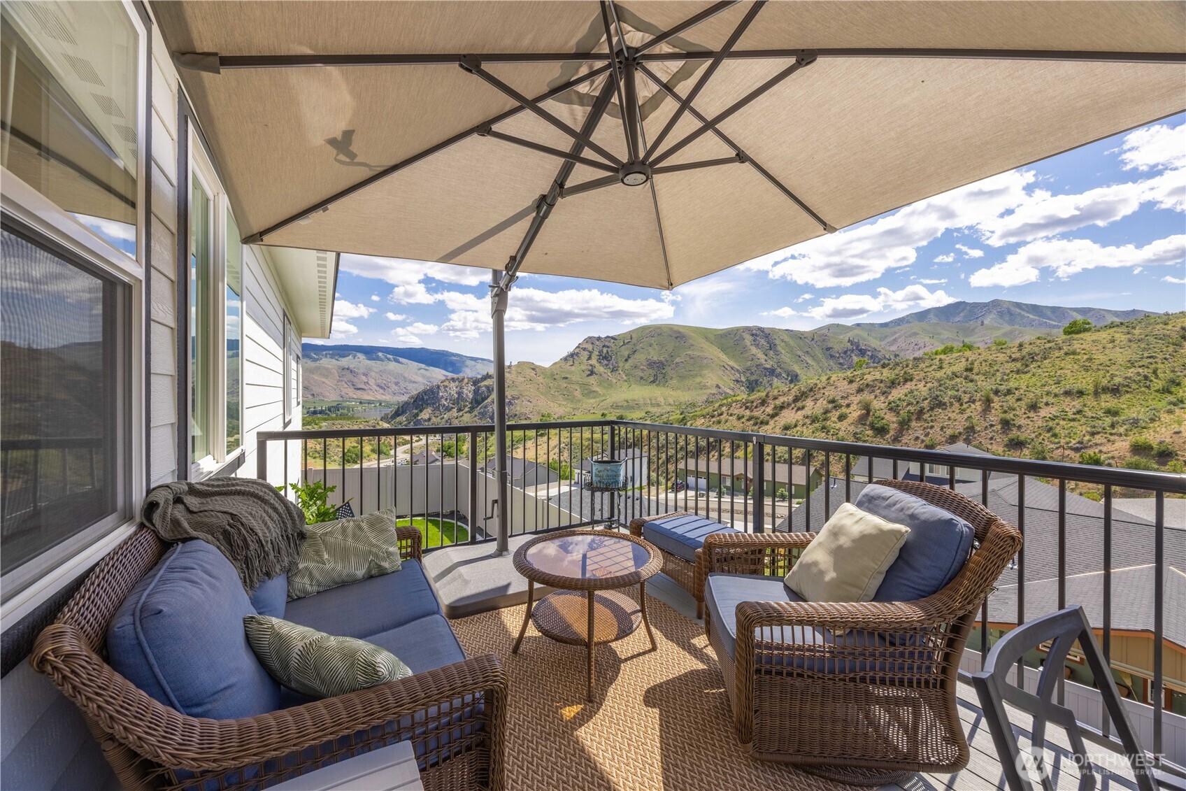 9968 Griffith Place Entiat, WA 98822 - Photo 29 of 38 a balcony with outdoor seating and outdoor seating