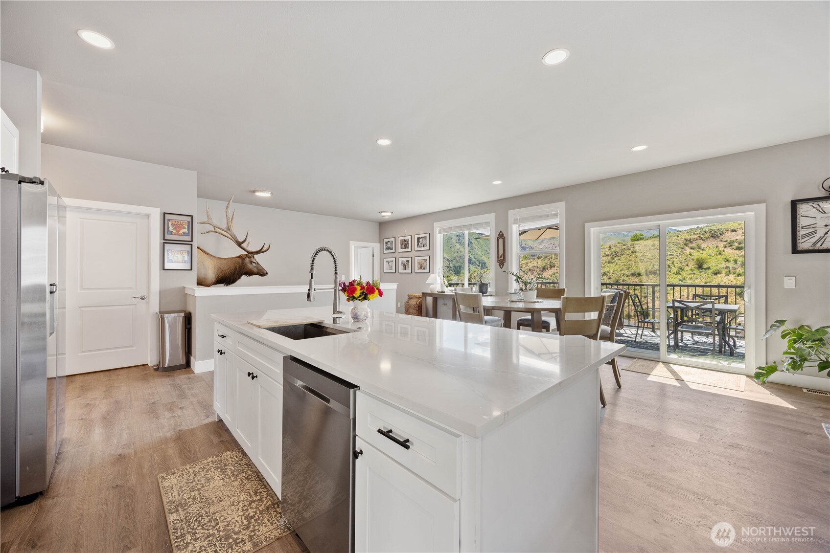 9968 Griffith Place Entiat, WA 98822 - Photo 10 of 38 a large white kitchen with a large window