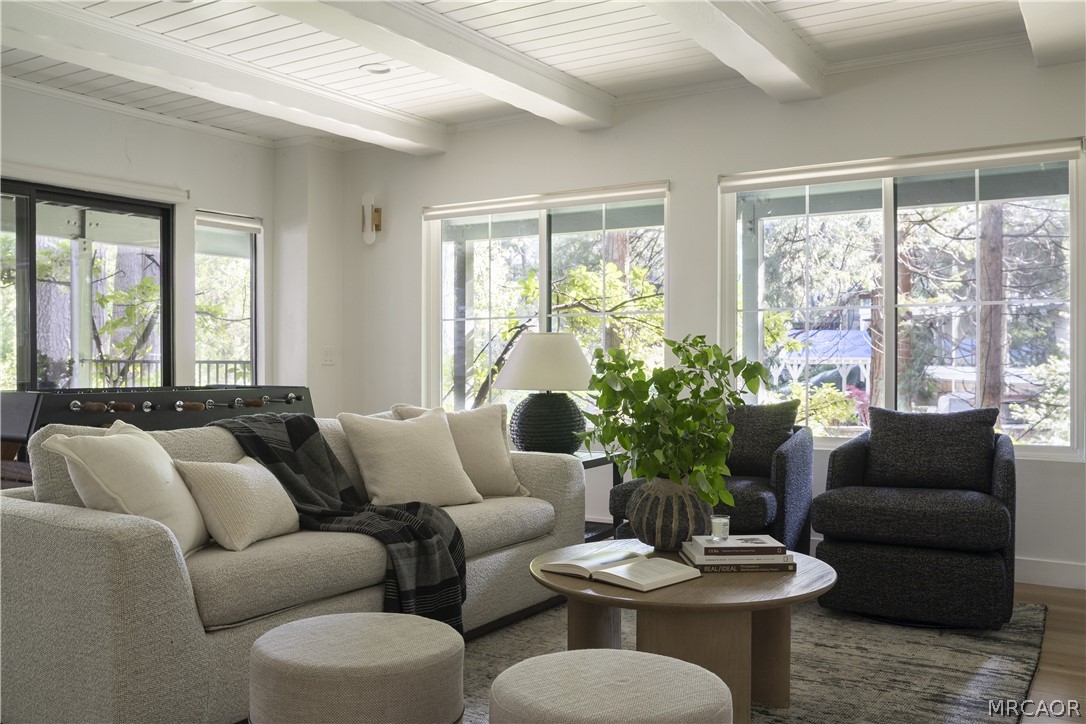 27643 West Shore Road, Unit 2 Lake Arrowhead, CA 92352 - Photo 20 of 28 a living room with furniture and a large window