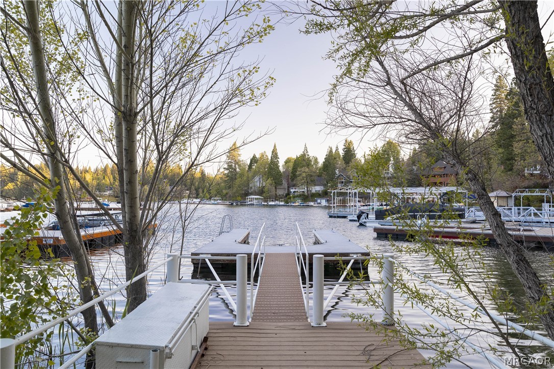 27643 West Shore Road, Unit 2 Lake Arrowhead, CA 92352 - Photo 3 of 28 a view of house with backyard and seating space