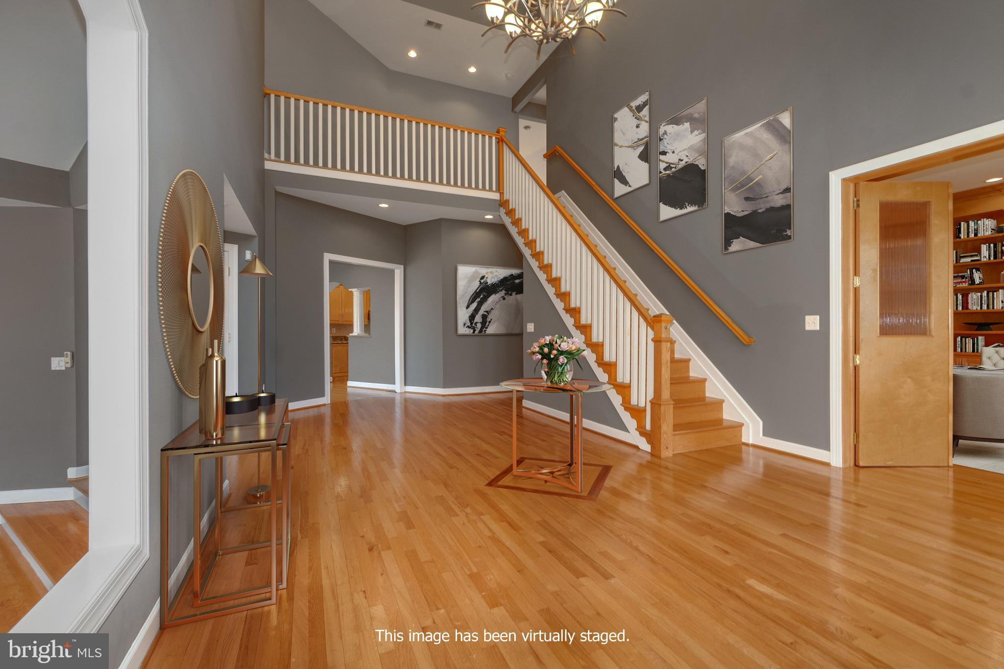 11261 South Glen Road Potomac, MD 20854 - Photo 4 of 55 Dramatic foyer with gleaming hardwood floors