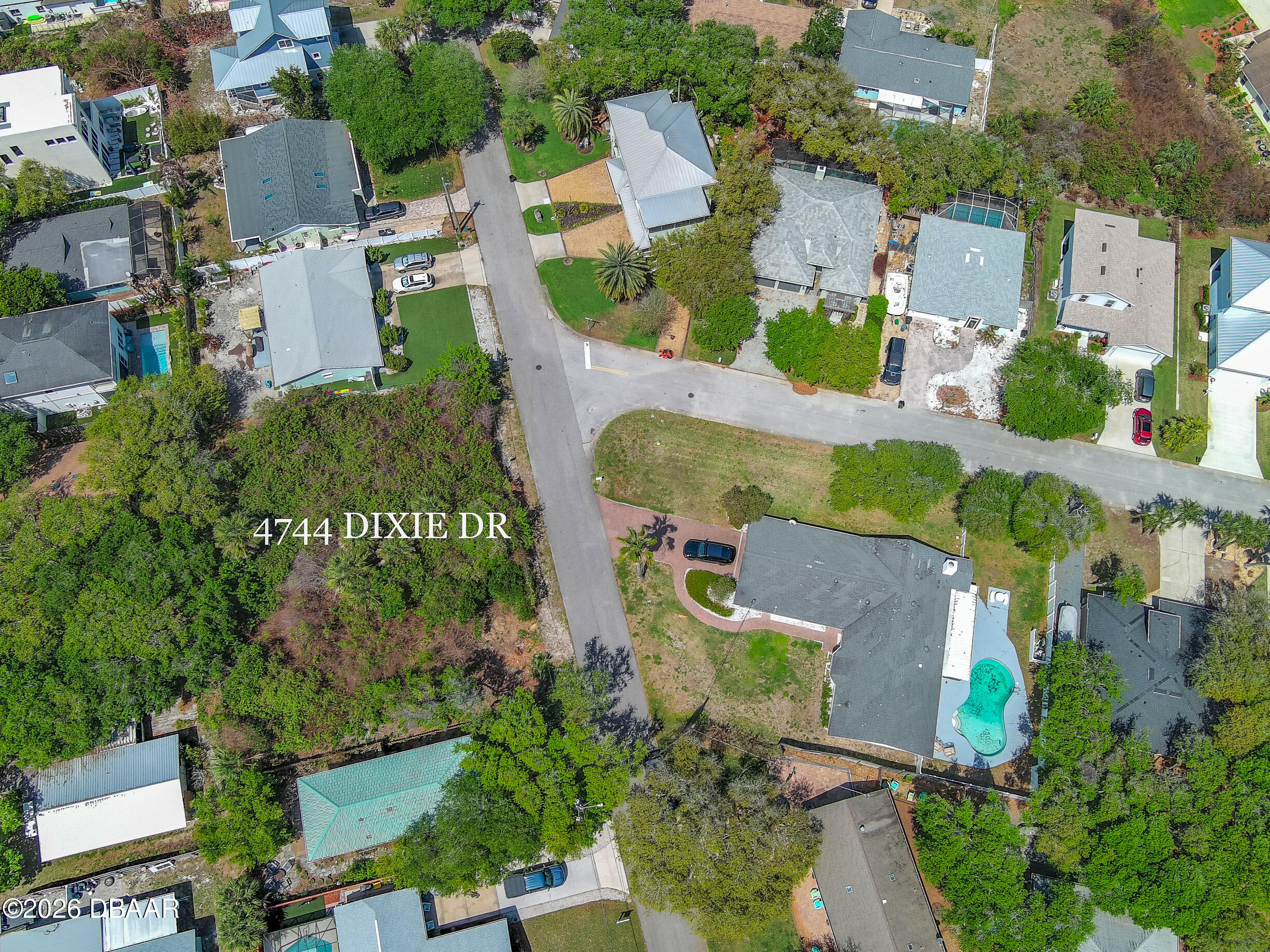 4744 Dixie Drive Ponce Inlet, FL 32127 - Photo 4 of 15 an aerial view of residential houses with outdoor space