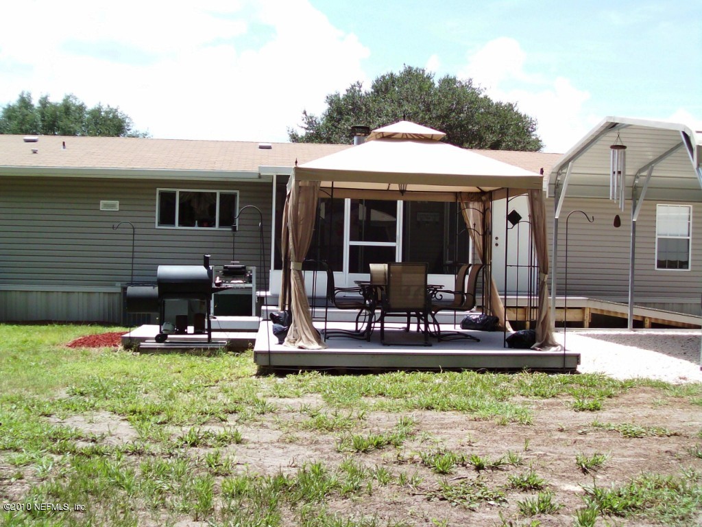 248 Tanner Road Florahome, FL 32140 - Photo 12 of 28 Covered Deck