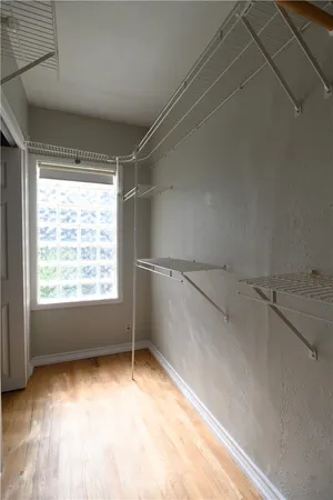 a view of a room that has a window in it