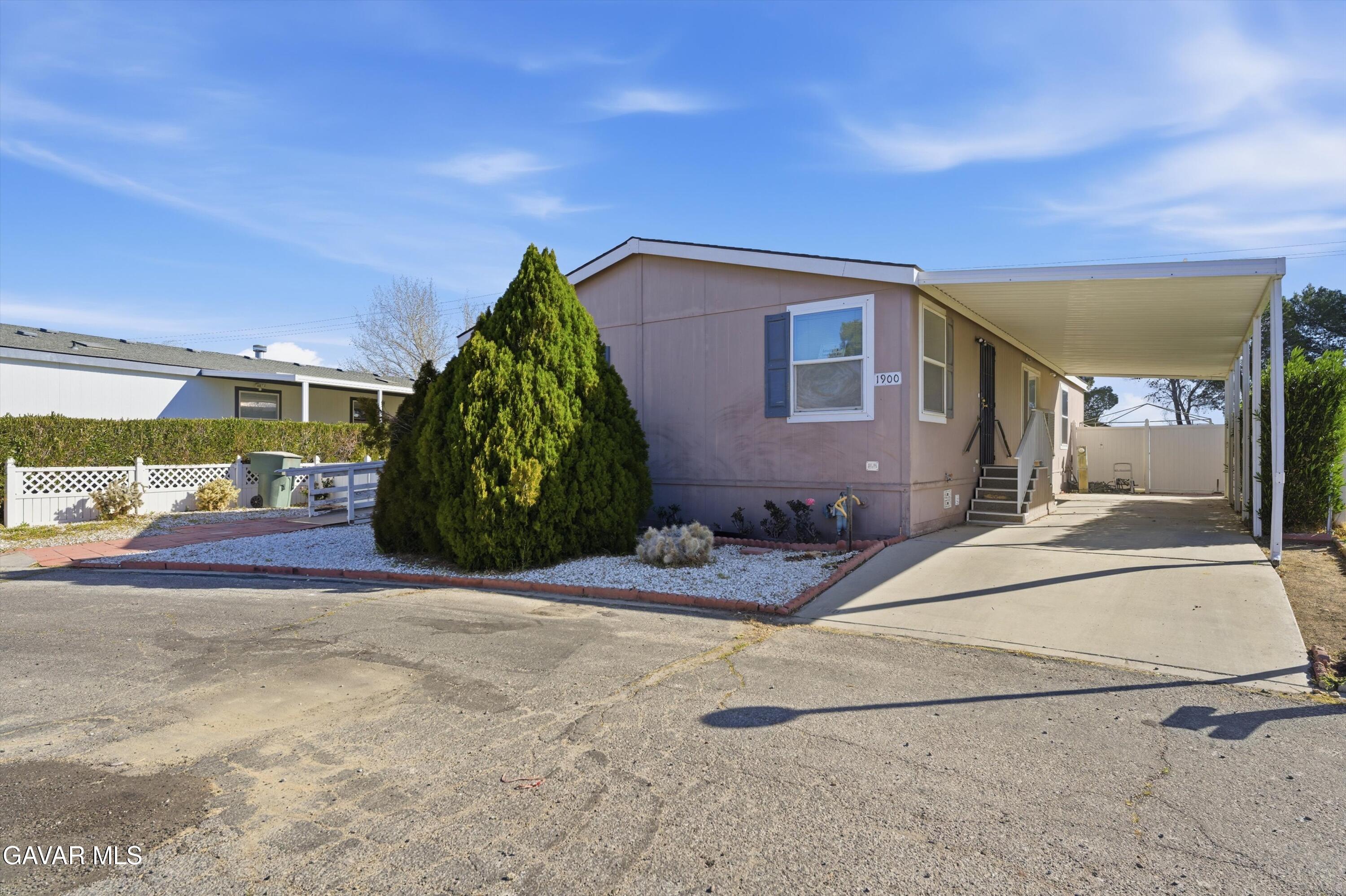 1900 Sandra Way Rosamond, CA 93560 - Photo 2 of 20 a house view with a backyard space