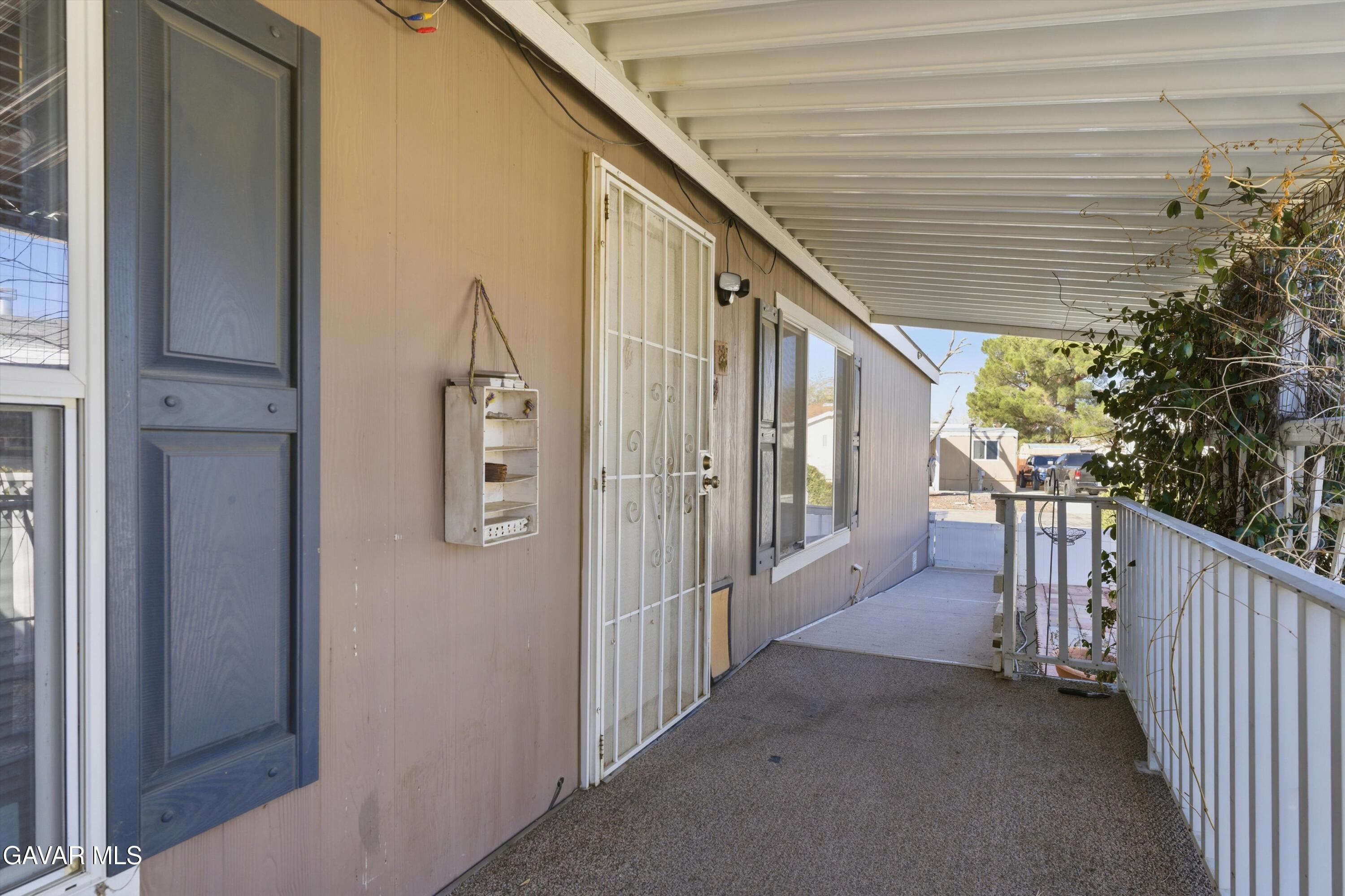 1900 Sandra Way Rosamond, CA 93560 - Photo 3 of 20 a view of a porch
