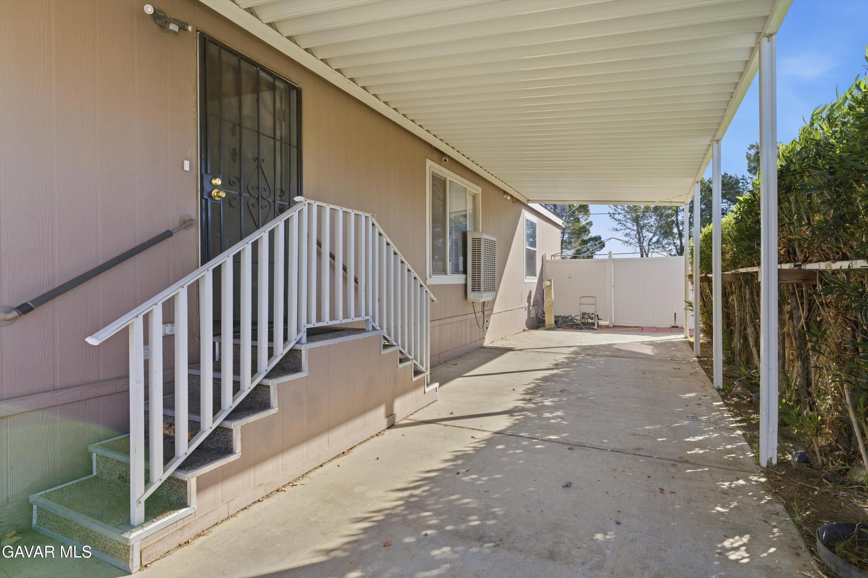 1900 Sandra Way Rosamond, CA 93560 - Photo 4 of 20 a view of staircase with railing and white walls