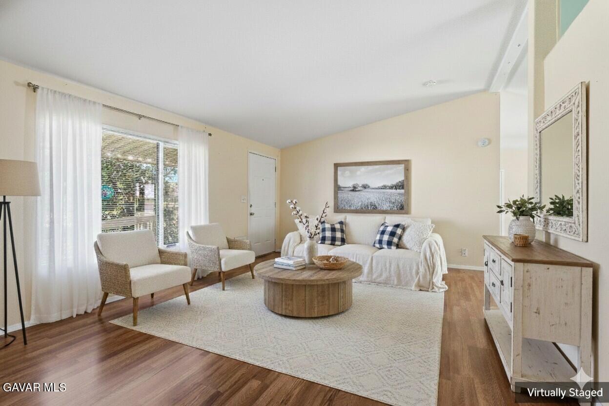 1900 Sandra Way Rosamond, CA 93560 - Photo 6 of 20 a living room with furniture and a potted plant