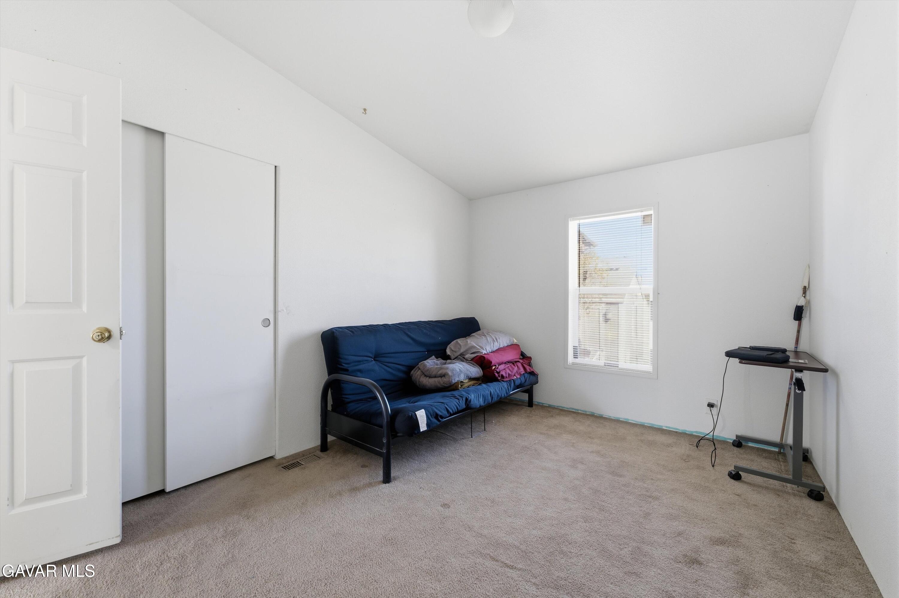 1900 Sandra Way Rosamond, CA 93560 - Photo 10 of 20 a living room with furniture and a window
