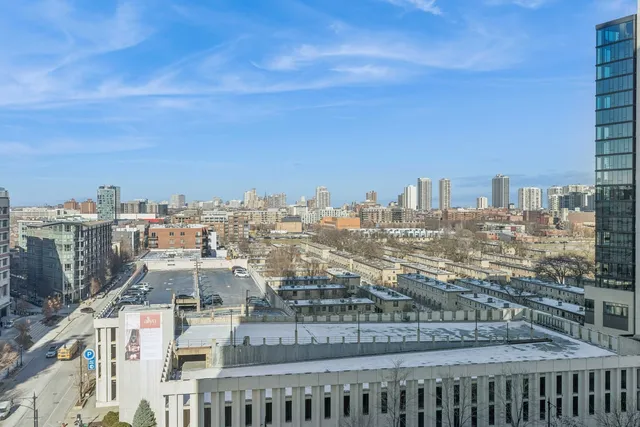 a view of a city with tall buildings