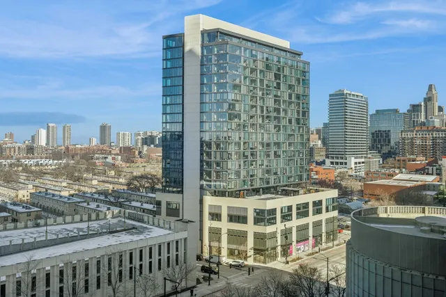a view of a city with tall buildings