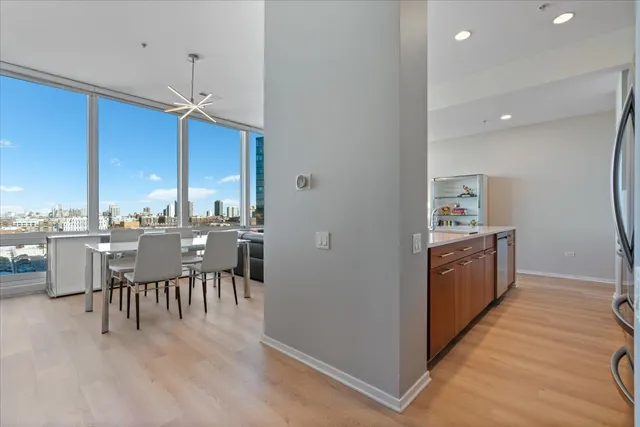 a open kitchen with a table and chairs