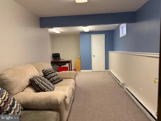 a bedroom with a bed and furniture