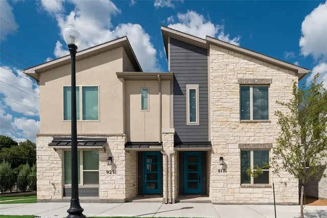 a front view of a house with street