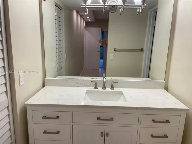 a bathroom with a shower and a toilet