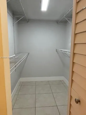 a view of livingroom with kitchen