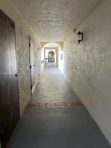 a view of a hallway to a house