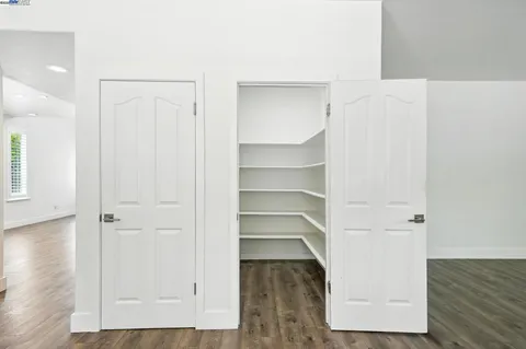 a bathroom with a bathtub and a window