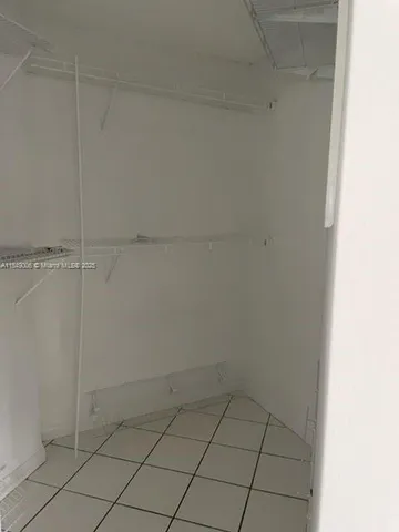 a bathroom with a bathtub and a toilet